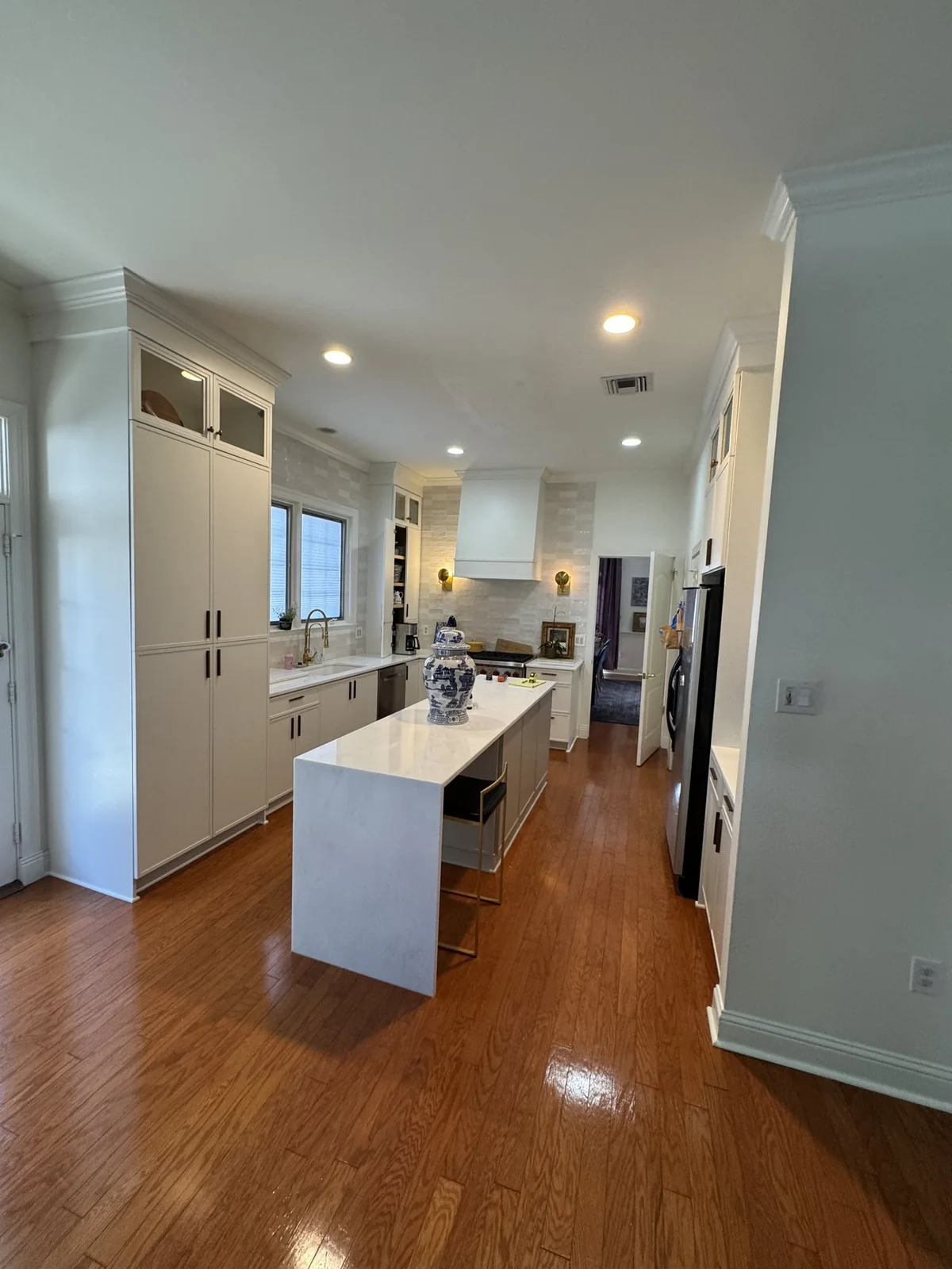 Before: the existing wood flooring around the newly remodeled kitchen.