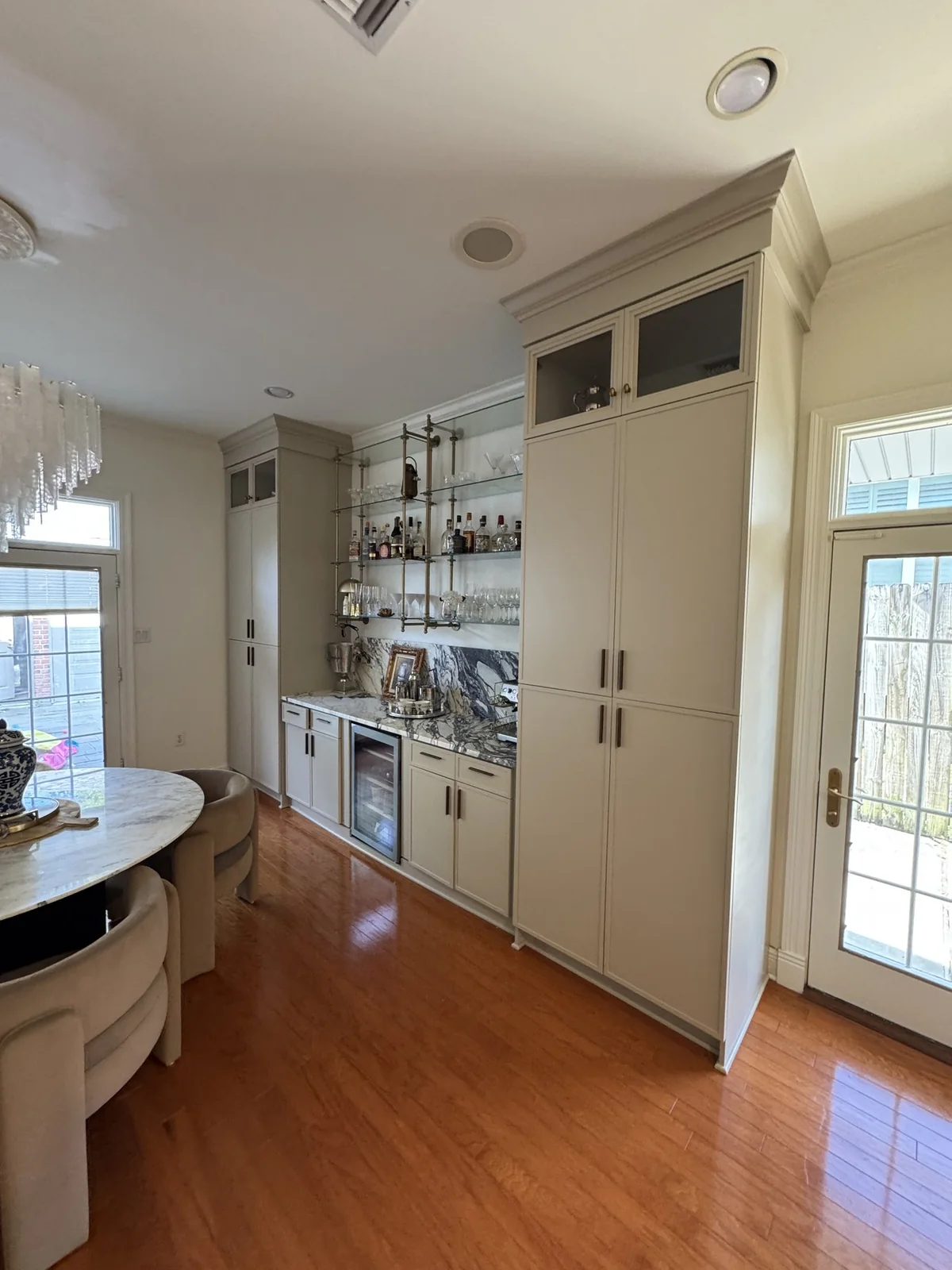 Before: existing wood flooring beside the dining-area cabinetry.