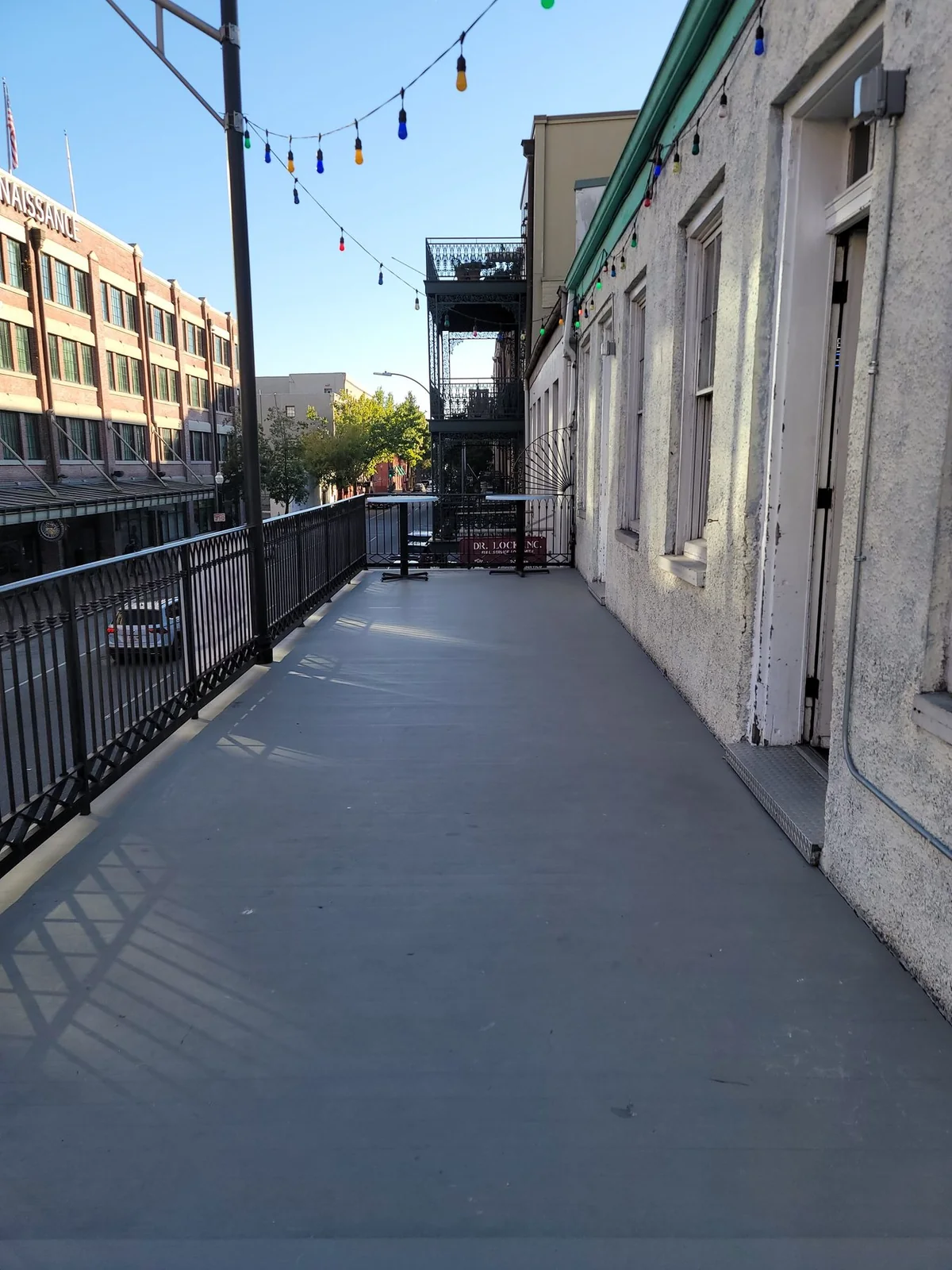 The finished outdoor gallery deck and railing in 2020.