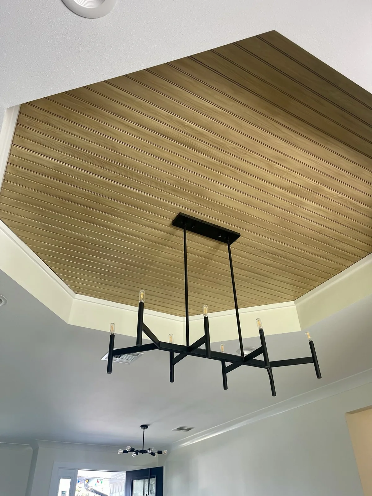 Wood ceiling and chandelier detail